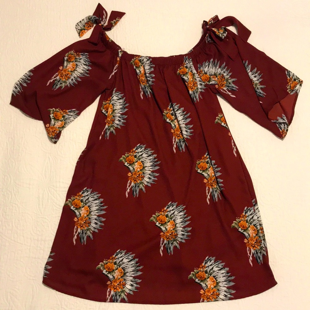 Cavenders: Off the shoulder floral & feather dress